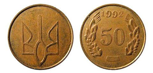 латунная монета